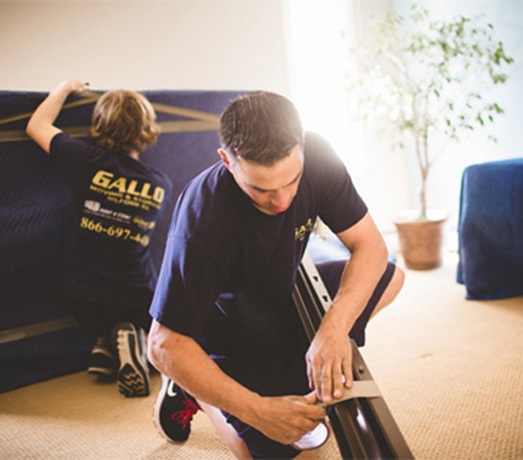 movers packing up furniture in Ashland MA